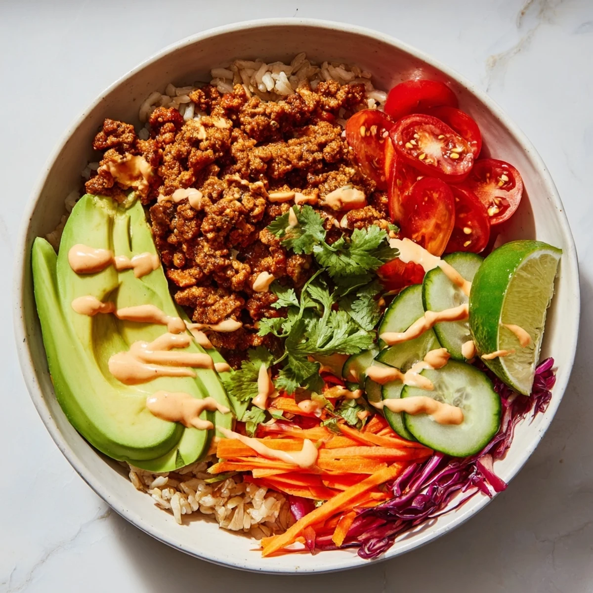 Delicious plant-based meat bowl with avocado, quinoa, and bold spices melded together.