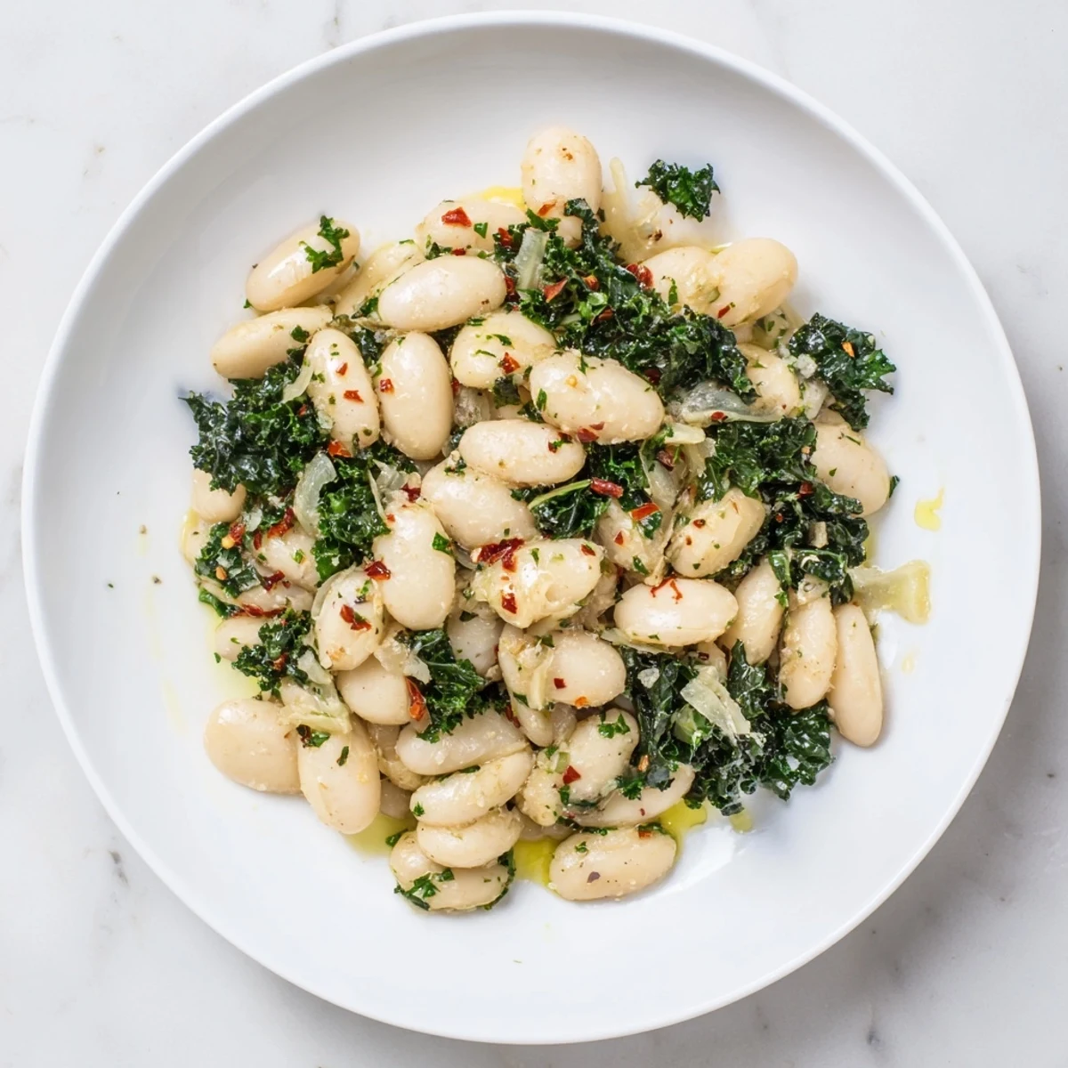 Hearty Garlicky Beans with Winter Greens, featuring tender beans and lush greens, perfect for a cozy meal.