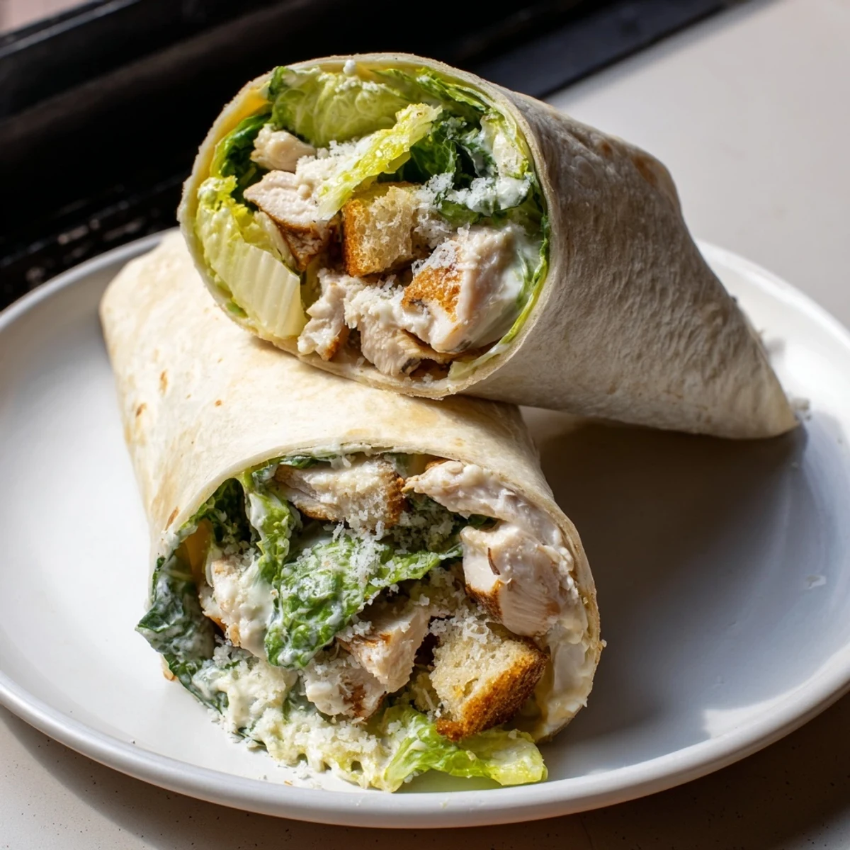 These Chicken Caesar Wraps, ready in minutes, show off a delightful, healthy lunch option.