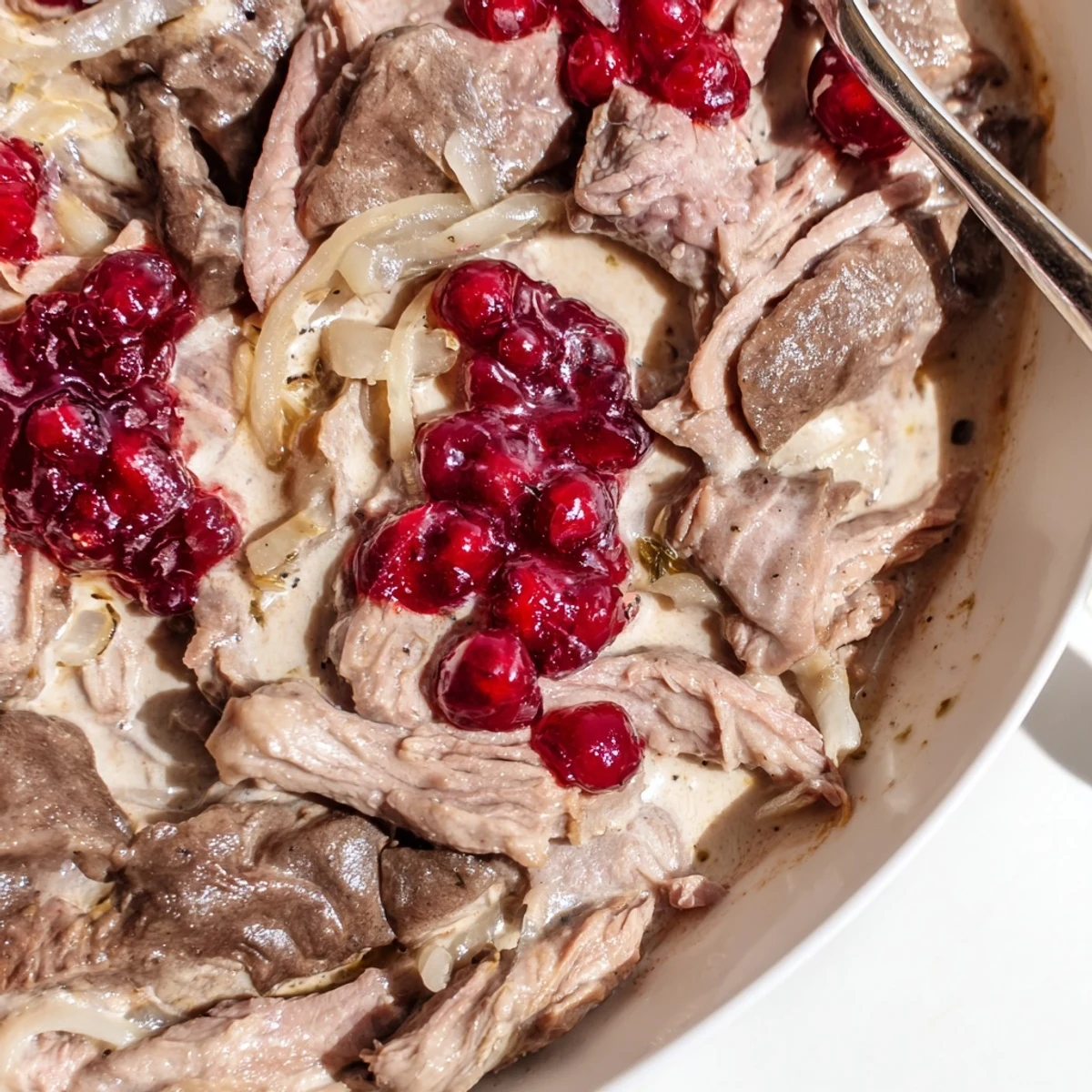 Delicious Finnish reindeer stew with tender meat and a rich gravy, perfect for a cozy meal.