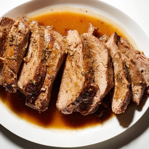 Savory Budget Holiday Chuck Roast, cooked until fork-tender, ready for a delicious meal.