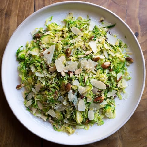 Crunchy Lemon Parmesan Brussels Sprouts Salad: a bright, flavorful salad with shaved Brussels sprouts and Parmesan.