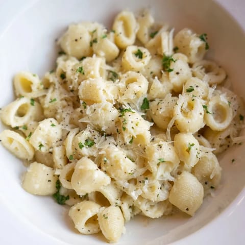 A close-up of steaming 15-Minute Creamy Garlic Butter Ditalini, a quick and satisfying meal.